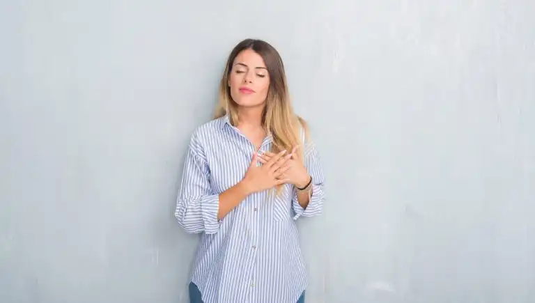 Placing-his-hand-over-his-Heart