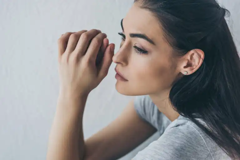 This image shows a depressed woman thinking